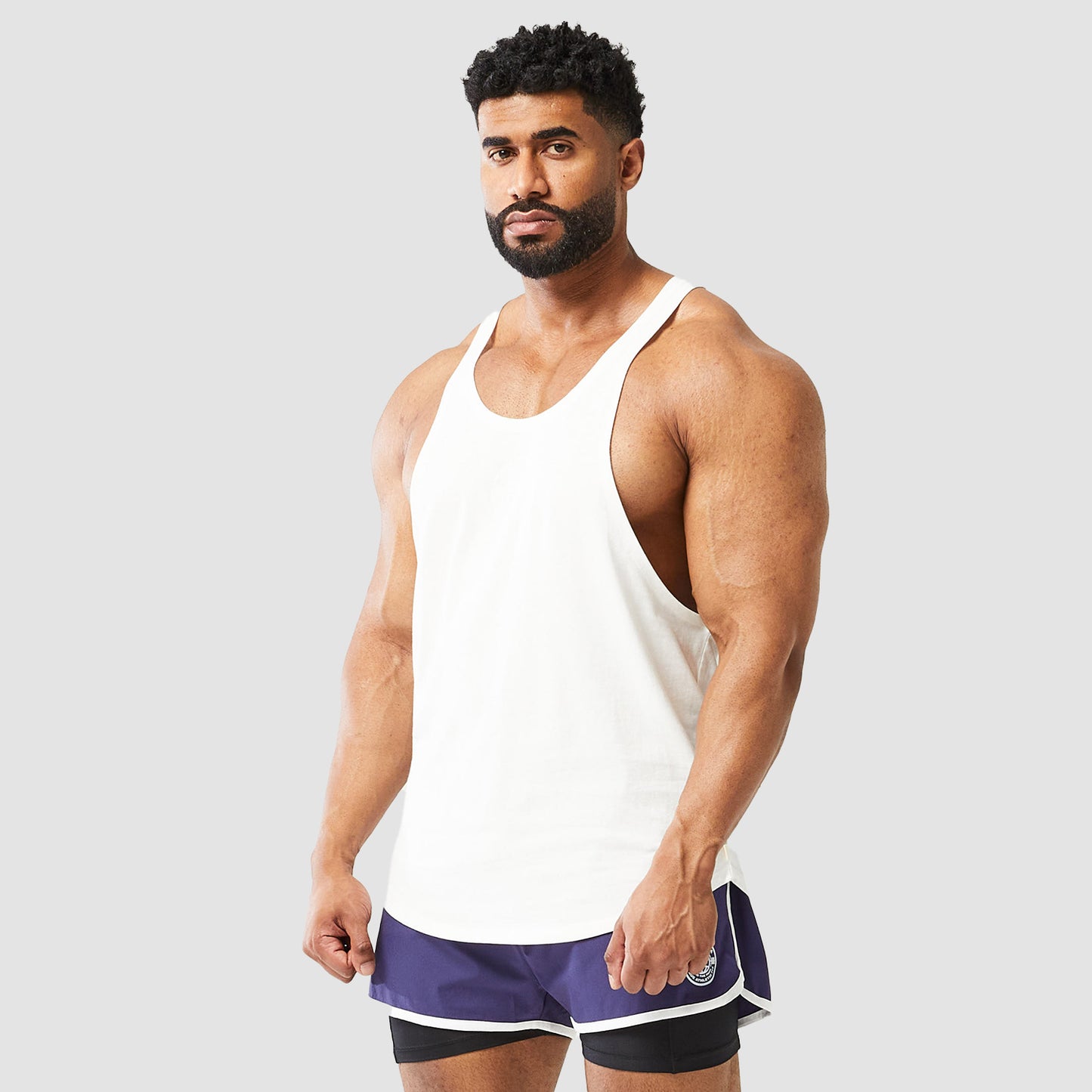 squatwolf-gym-wear-golden-era-stringer-white-workout-stringers-vests-for-men