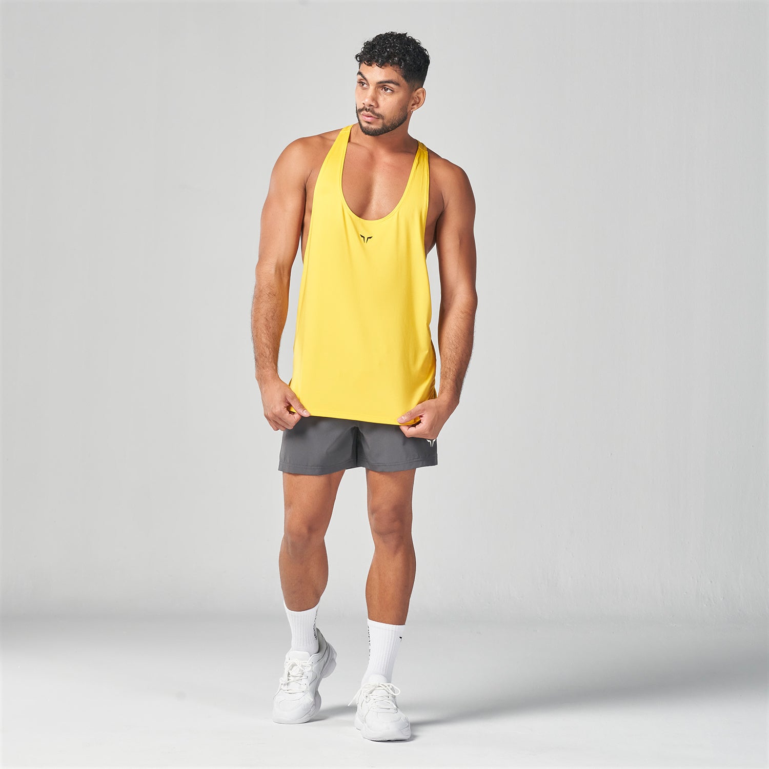 squatwolf-gym-wear-essential-gym-stringer-yellow-stringer-vests-for-men