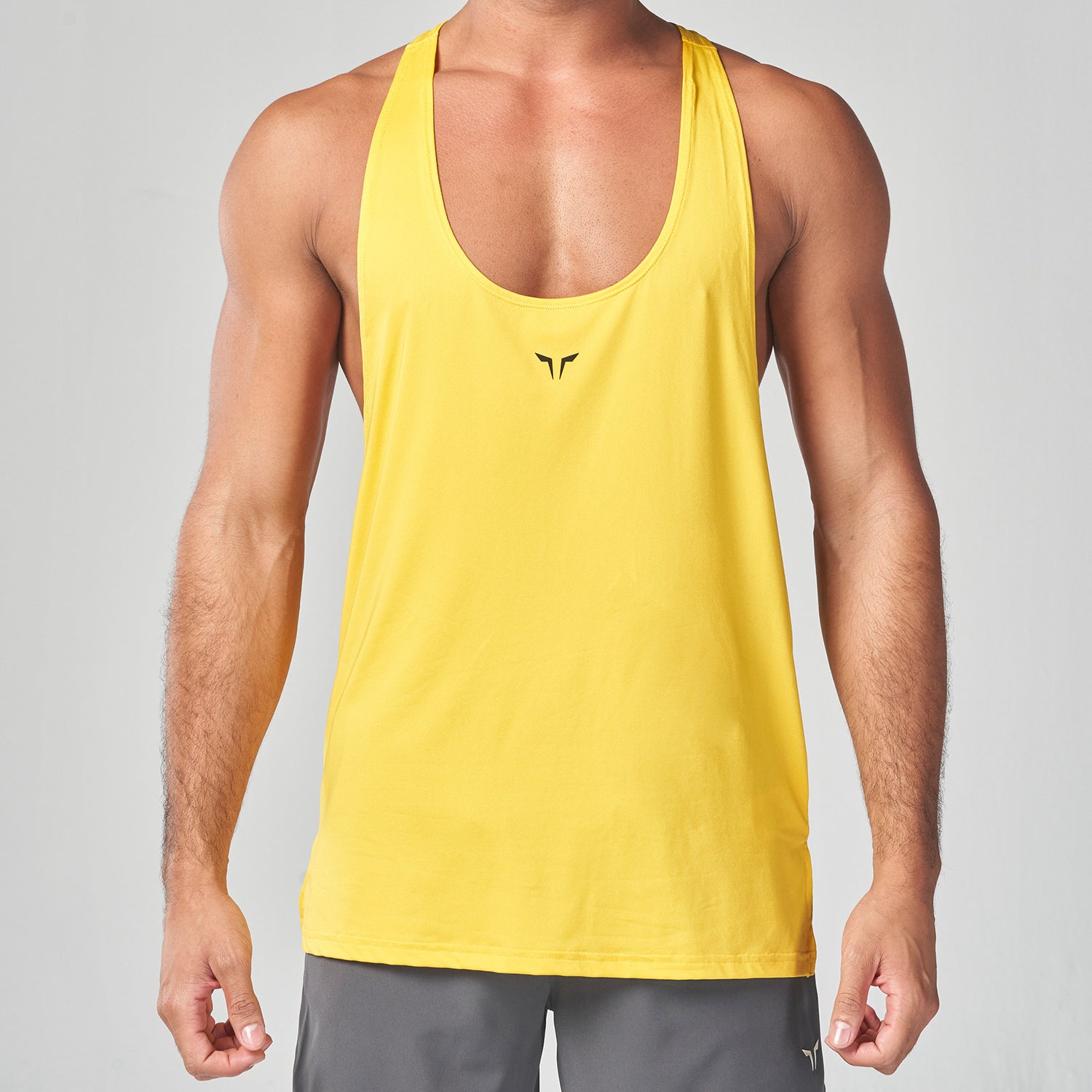 squatwolf-gym-wear-essential-gym-stringer-yellow-stringer-vests-for-men