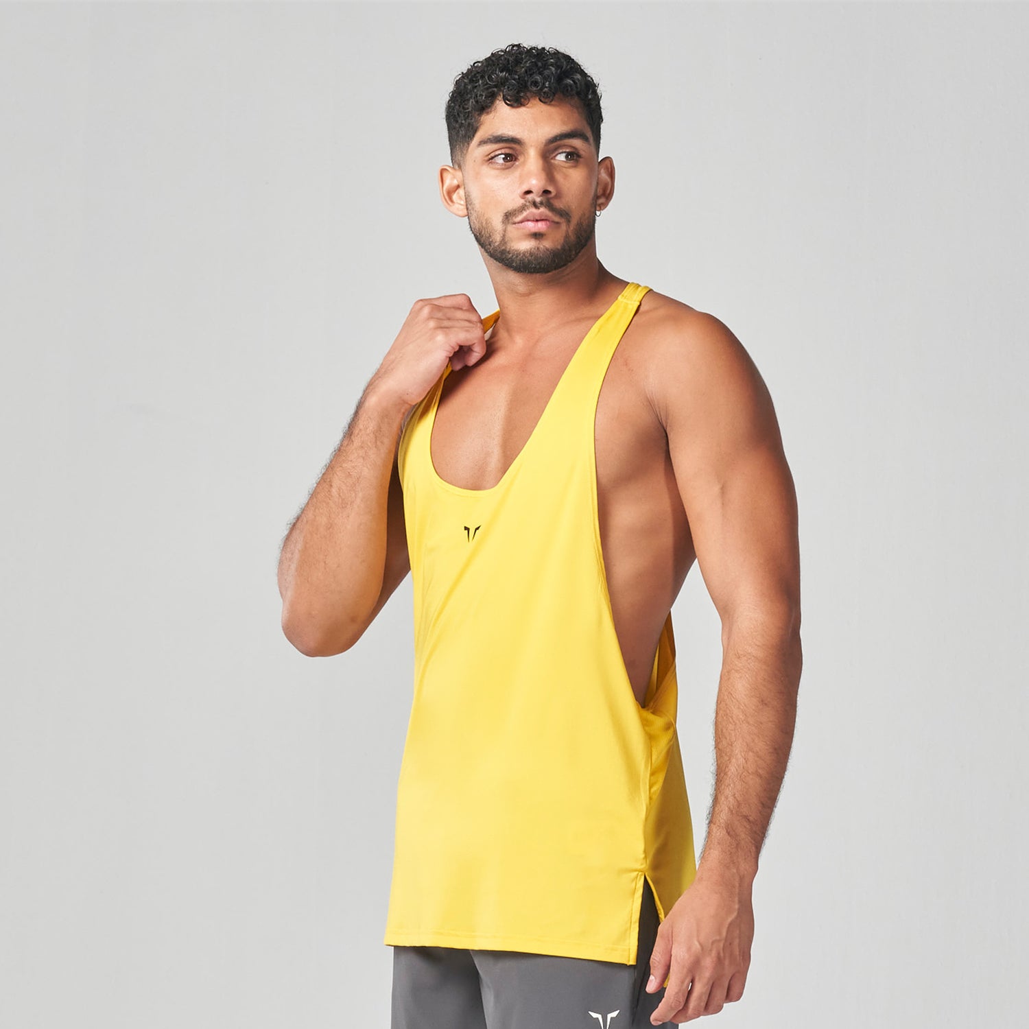 squatwolf-gym-wear-essential-gym-stringer-yellow-stringer-vests-for-men